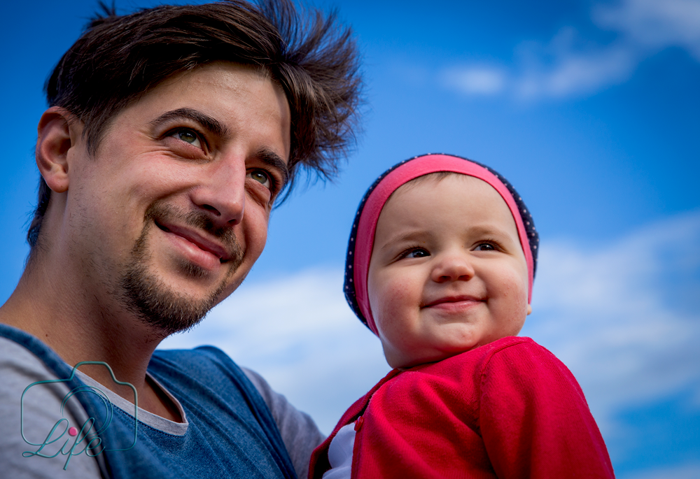 Portrait-Foto: Papa mit Tochter auf dem Arm